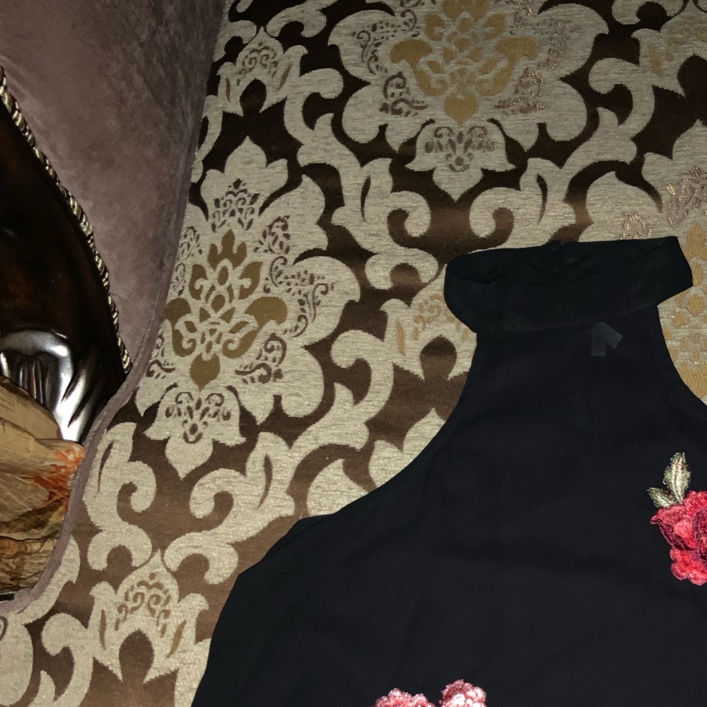 Black sheer blouse with neck strap and rose acc